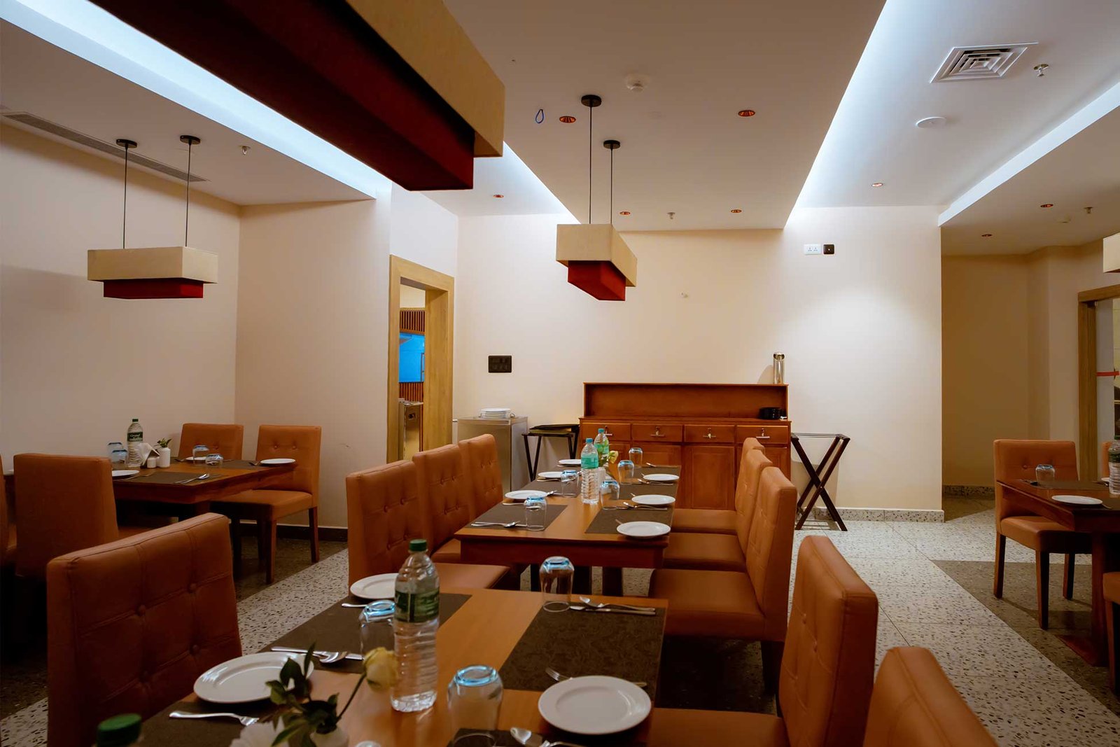 Dining tables and seating at Beeza Clubhouse